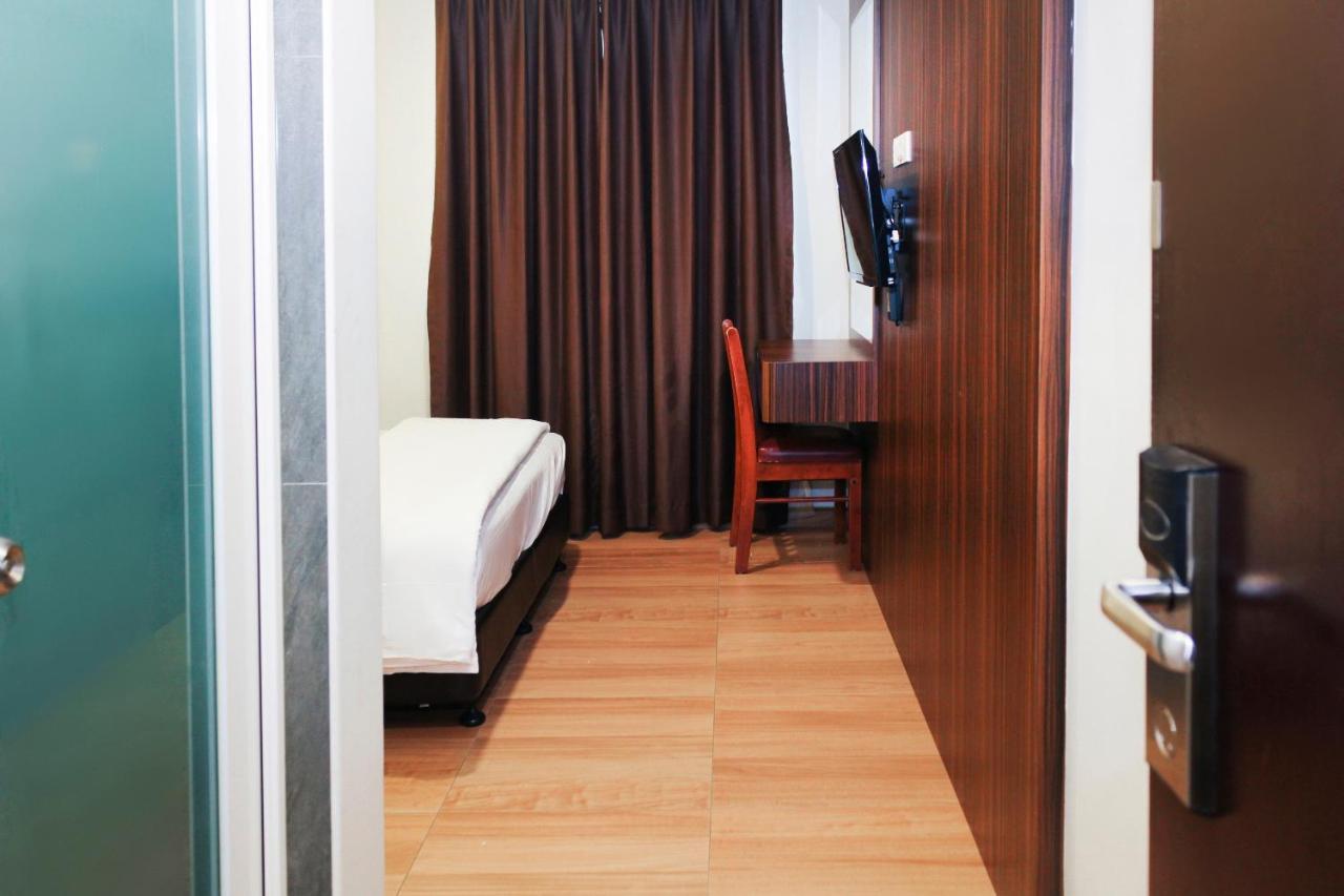โอโย 90027 แฮปปี้ โฮเต็ล Hotel ยะโฮร์บาห์รู ภายนอก รูปภาพ